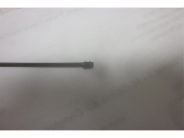 There are two (2) small set screws that tighten the encoder to the motor shaft. Using a 1.5mm hex key loosen both screws. Use caution as they are easily lost. Remove the two (2) small screws attaching the encoder to the motor housing and carefully remove the encoder.