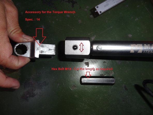 Use a special torque wrench with a 14mm box end wrench adapter and a short cut 14mm hex driver to loosen the 5 screws that attach the Y Axis column to the X Axis. See photo 1 for locations and photo 2 for tools.