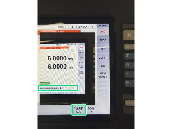 In DRO mode, select TURRET LOC, then enter desired tool station, followed by ABS SET.