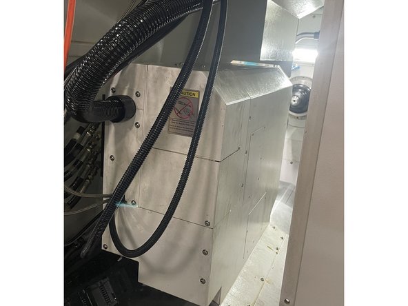 If it is determined that the Sub-Spindle needs a vertical alignment there are a few more covers that need to be removed. The next few steps will show you which ones.