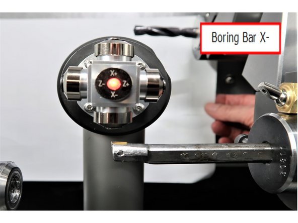 Move the tool away from the probe to ensure full clearance.