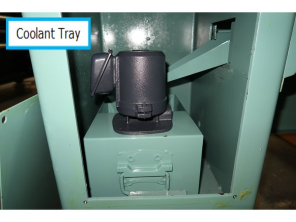 Bolt the motor to the coolant tray. Connect the coolant hose to the motor using the fitting.