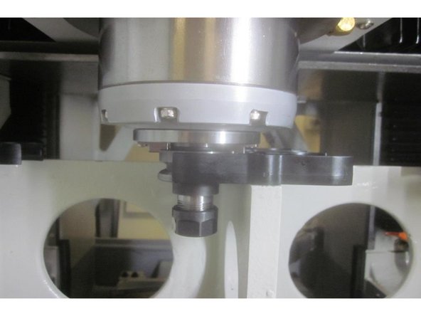 Using the hand wheel, highlight the &quot;Z Tool Change&quot; number. Place a tool holder in any location. Jog X and Y to match the assigned tool location numbers. Press the &quot;Orient on&quot; key. Press the &quot;Unclamp tool&quot; key. Slowly lower the Z axis engaging the drive dogs until the air from the spindle just stops. Raise it until it just starts.