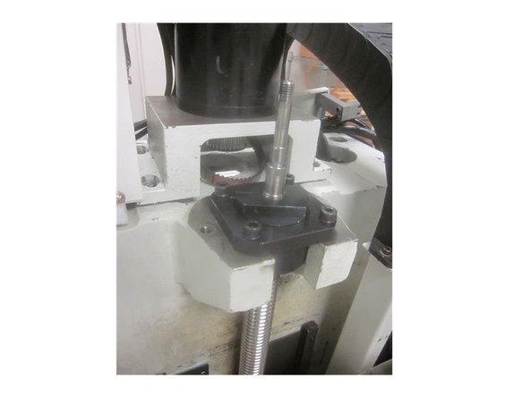 If not completed, install the belt sprocket and related hardware mentioned in step 5. Install the stand offs. Install the belt.   Leave the belt off the motor. Leave off the brake cover. Place the brake / plate assembly on between the standoffs. Install the coupling bushing, washer, star nut and lock nut.