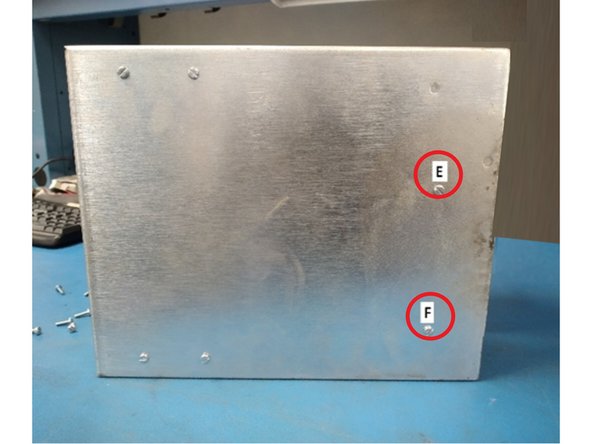Remove two (2) screws label as E, F.