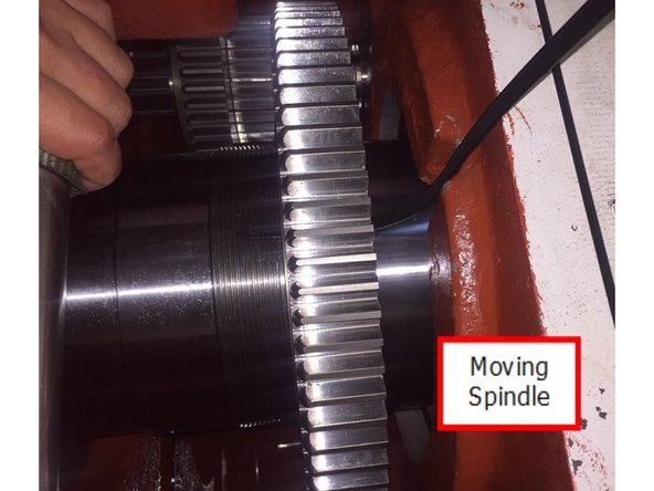 Now slowly start to move the spindle out of the casting until low gear is free of the main drive key for high and low gears.