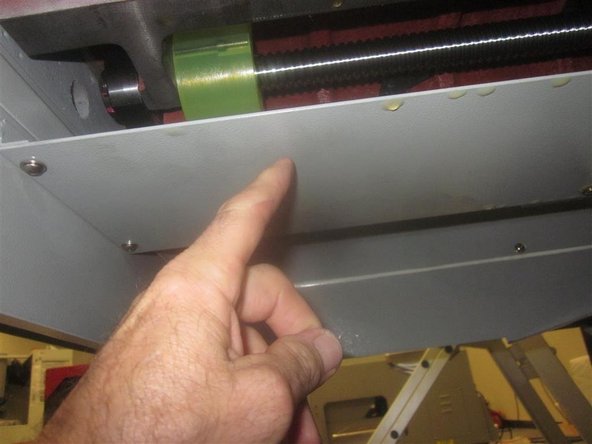 Remove the main ATC air cylinder from its rear mount via the pivot pin, and re-install the pin and &quot;e&quot; clip. Disconnect the air cylinder at the rod end, leaving the rod end attached to the ATC carriage. Note the &quot;depth&quot; which the shaft is installed at for ease of re-assembly and adjustment.