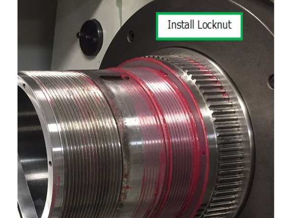 Caution! Do not heat the bearings above 180° F (82° C). AFTER the bearings are heated, apply a generous coat of DTE 24 oil to the bearings before the bearings are installed onto the spindle.