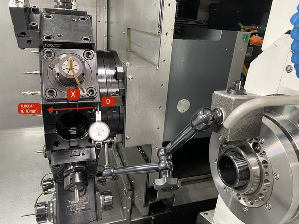 Set up your indicator to measure the horizontal accuracy (X Axis). Zero the indicator on the right side of the tool holder mounting surface and measure to the left. See Photo 1