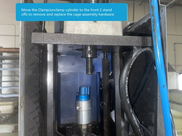 Remove the blue and black air lines from the Clamp\Unclamp cylinder.