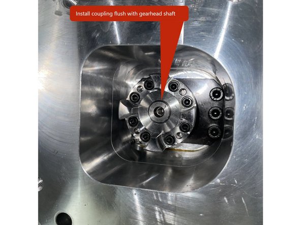 Install coupling flush with the gearhead shaft as shown in PHOTO 1. Tighten the screws in a crossing pattern to lock the taper lock to the gearhead drive shaft.