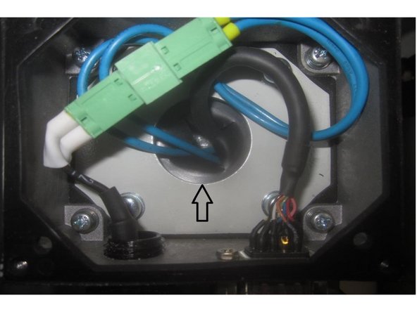 Guide the encoder cable and fan wires through the fan cover / junction box and in stall the fan cover. Install the four (4) screws for the cover and tighten securely.
