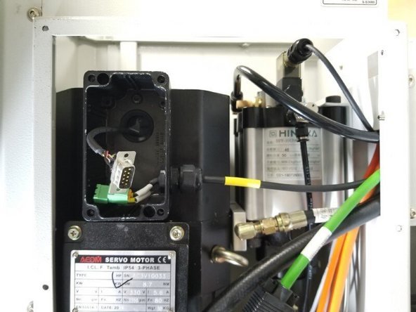 Carefully remove the encoder DB9 plug/cable assembly from the service box. Use care feeding it through the service box grommet as the wires are small and delicate.