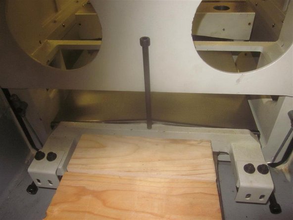 Using a slide hammer (dent puller) or similar tool, remove the two (2) tapered pins (one on each end) from the bridge. Remove the (7) seven 8mm SHCS that attach the bridge to the base casting.