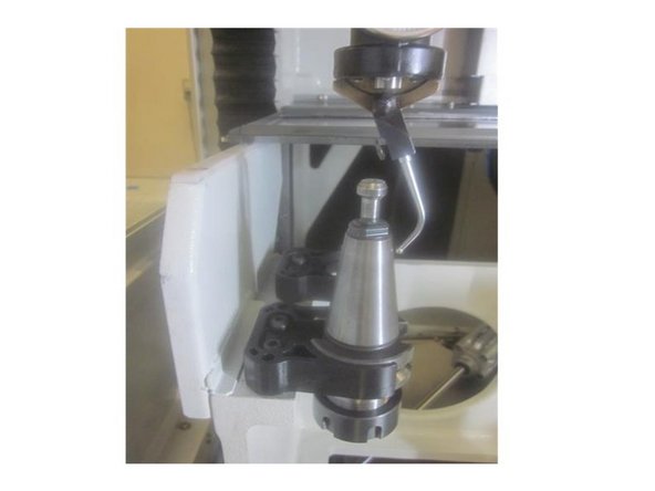 In DRO set the spindle speed at 150 rpms. Go to service code 520. Press the &quot;ATC front &quot; key then the &quot;Input table&quot; key. Install a tool holder in the number 1 position.