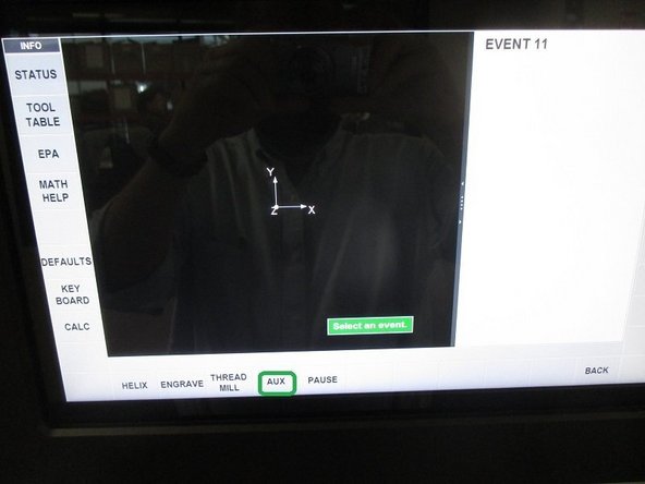 When programming the VMC2; press the more soft key, and then auxiliary function and slide aux output key to yes.