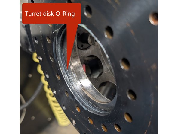 Once the turret ring is aligned to the coolant ring and the O-Rings in the turret ring have been inspected, the turret disk can be reinstalled.