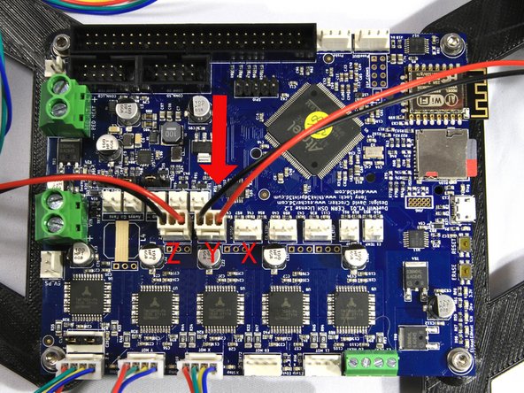 Flip the printer back over and on your workbench if you haven't done so already.