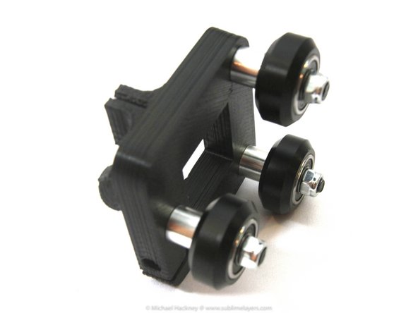 Make sure the wheel can spin without being loose or so tight that the bearings feel like they are grinding.