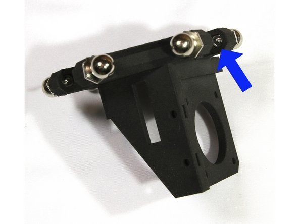 Install six ball studs with M3 nuts on the effector as shown in the first photo.