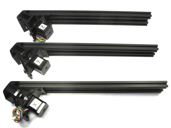 Locate the six square frame extrusions.  Attach two of these on the right side of each corner assembly as shown in the photo.