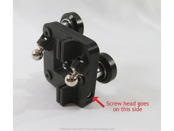 Note the orientation of the carriage adjusting screw. The head of the screw inserts from the right side of the carriage.