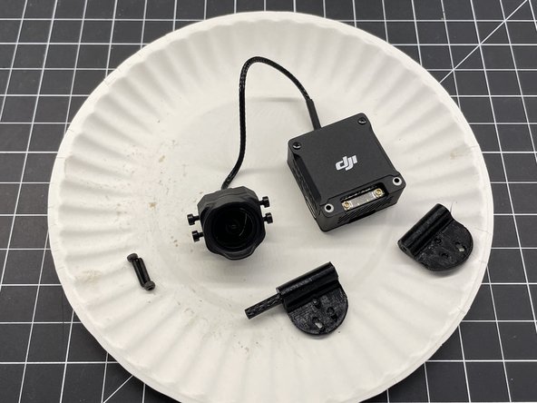 Insert M2 standoff in each TPU camera mounts (pic #1)