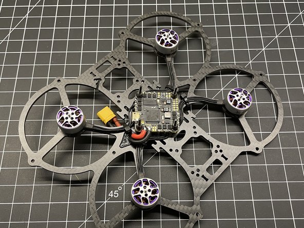 Trim approx 3mm of insulation, pre-tin VBAT lead wires, and solder to FC pads (pic #2)