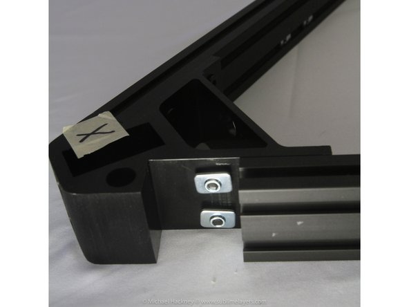 Lay out the three top assemblies on a flat surface with the labels facing up. Place the X assembly on your left, the Y assembly on your right and the Z assembly opposite you as shown in the first photo.