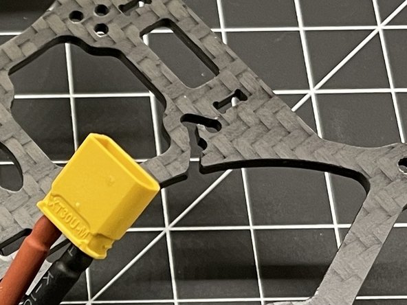 Raxus frame going forward will not have dog bone cutout for 1mm CF camera mounts. CF mounts are inflexible compared to TPU camera mounts (pic #1)