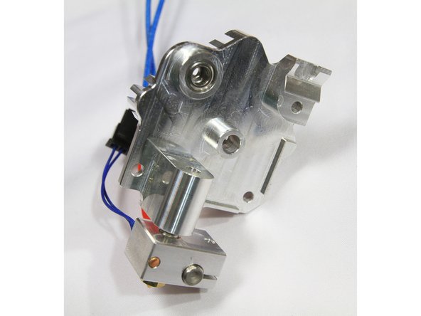 Align the top surfaces of the acetal and steel gears as shown and tighten the grub/set screw.