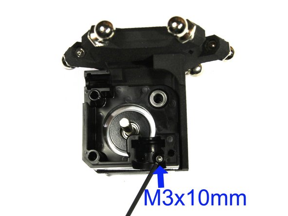Mount the stepper motor and Titan Body using an M3x10mm screw as shown. Refer to the E3D guide for more details.