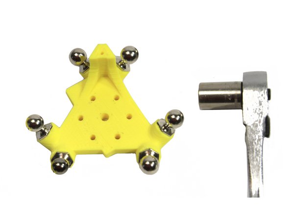 Use an M3x16mm SHCS to draw and seat the nuts fully into the nut traps as shown in first and second photos.