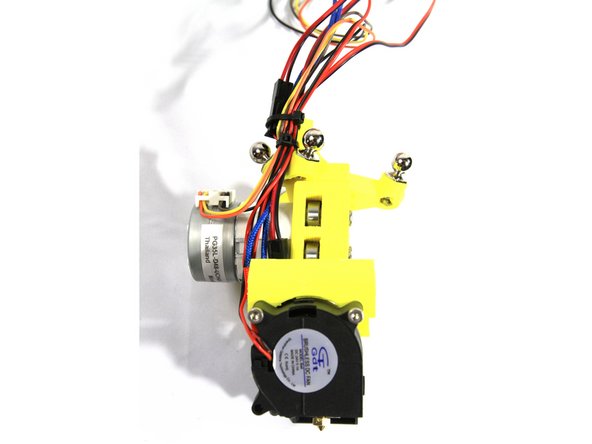 The second photo shows a side view of the wire routing.