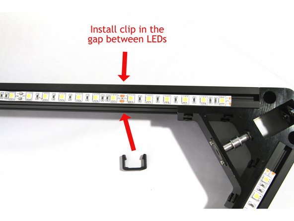Note that the terminals at each end of the LED strip are marked positive (+) and negative (-). You must align the installed strips so the (+) and (-) terminals align with each other as shown in the second photo.