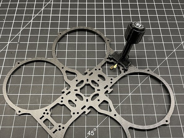 Place the antenna in the mount as shown. Your antenna may be different. The antenna shown is the 40mm Osprey from FlyFishRC for the DJI 03 Air Unit. (pic #3)