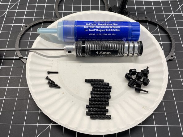 Insert M2x10 screws thru the 8 TPU feet (pic #1)