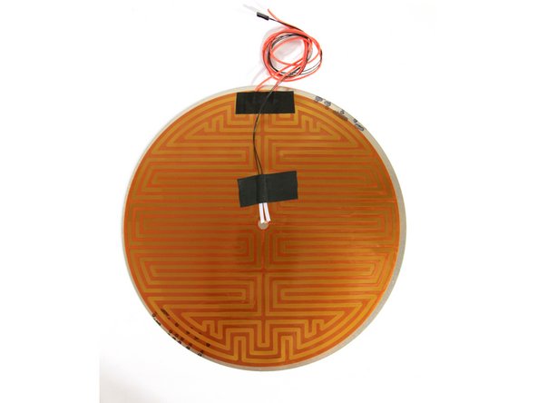 It does not matter which side you adhere the Kapton bed heater to – minor scratches are insignificant.