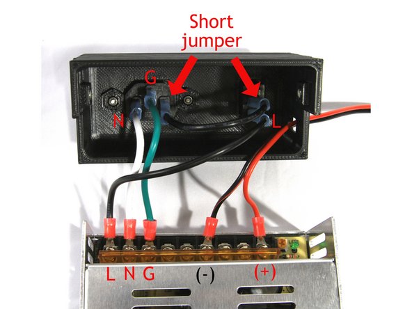 Install the wiring as shown in the first photo. The green (Ground), white (Neutral) and black (Live) wires are the US color designation for AC wiring. The pair of black and red wires on the right supply 24VDC to the printer.