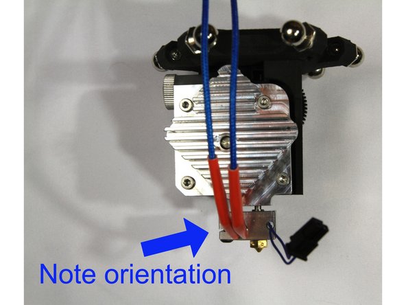 Install the heat sink / heater block assembly to the extruder body as described in the E3D guide. Note the orientation of the wiring and heater block.