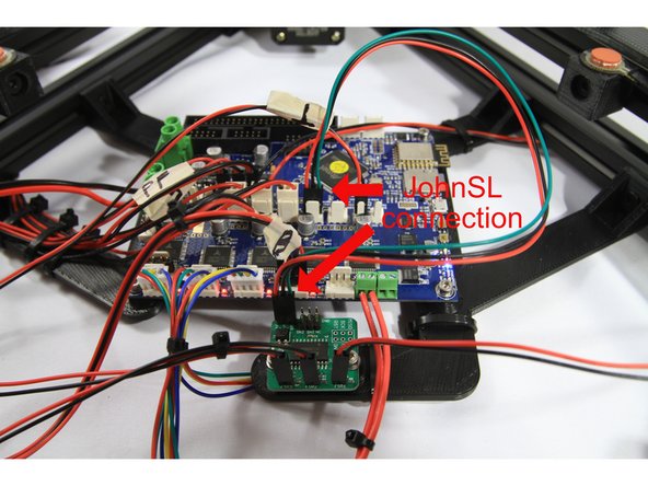 Connect the JohnSL board to the Duet as shown in the first photo. The red wire in the the three wire cable should be to the left on both the JohnSL and Duet.