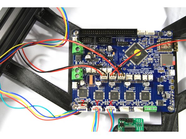 Connect the stepper motors to the Duet as shown in the second photo.