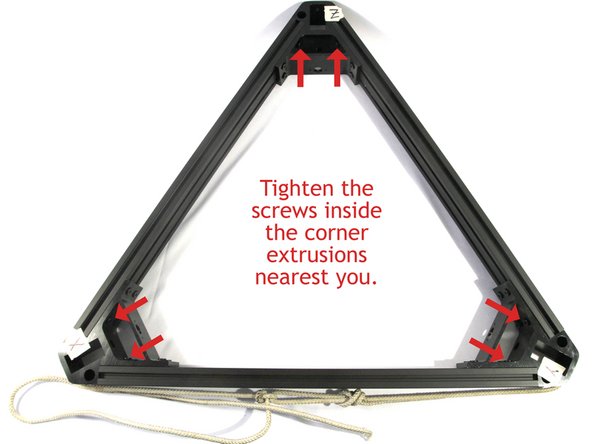 Tighten the six upper screws closest to you shown in blue in the photo.