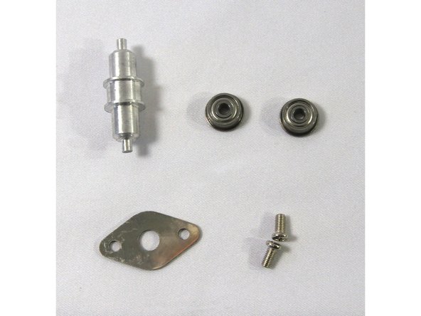 There are three sets of parts, one for each top corner bracket. The second photo shows the parts for one corner.