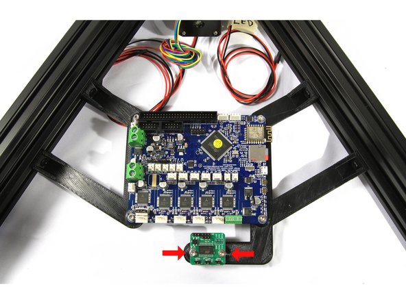 Mount the Duet Brackets to the base using four M5x10 Low Profile Socket Head screws as shown in the third photo.