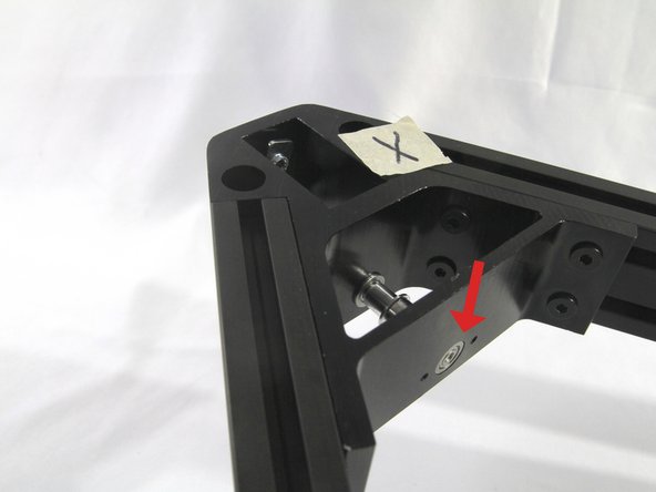 Finish the pulley assembly by installing the second flange bearing in the corner cross member as shown.