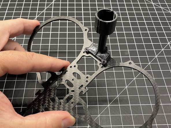 Position the antenna backwards as shown and then rotate it into position. (pic #2)