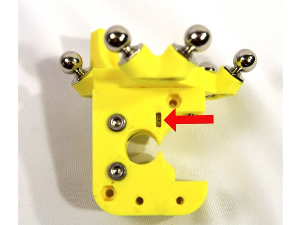 If the nut is difficult to install, clean out any plastic debris with an X-acto knife.