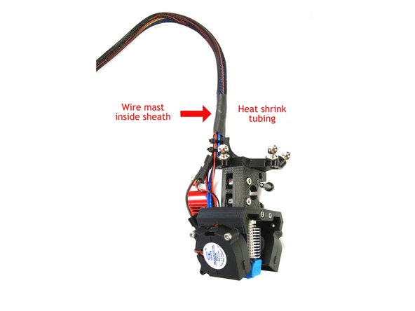 Make sure each set of wires is labeled above where you cut them to length. Once you cut off the knotted ends and connectors, you won't be able to tell them apart. You do not need to label the two thick blue wires or the four brown/black/yellow/orange stepper wires. Label the cooling fan pair, the hot end pair, and the thermistor pair.