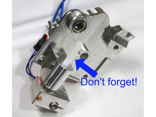 Cut a 23mm long section of PTFE tube and insert it in the heatsink as described in the E3D guide.